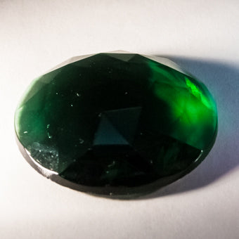 18X25MM OVAL FACETED GREEN